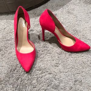 Hot pink suede pumps